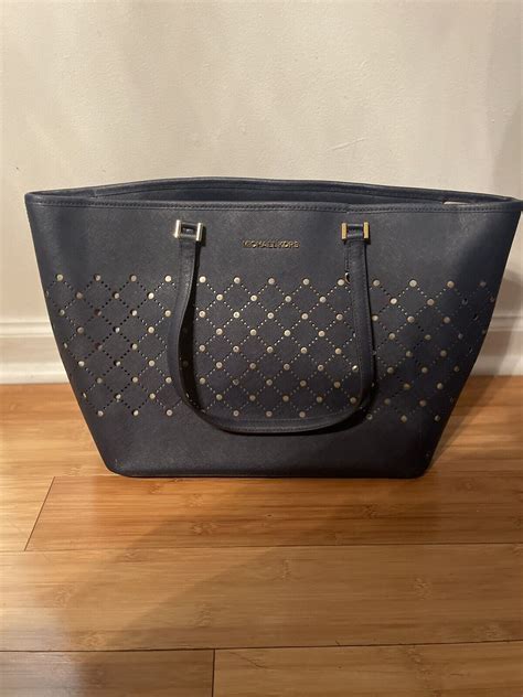 michael kors tote with star cut outs|michael kors tote for sale.